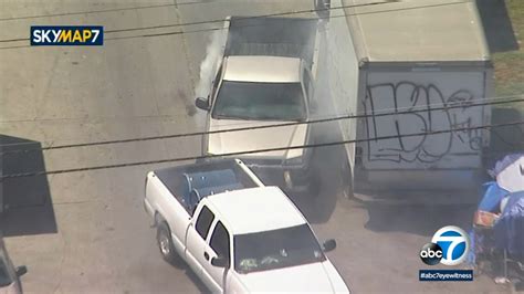 Stolen vehicle pursuit suspects taken into custody in downtown L.A.